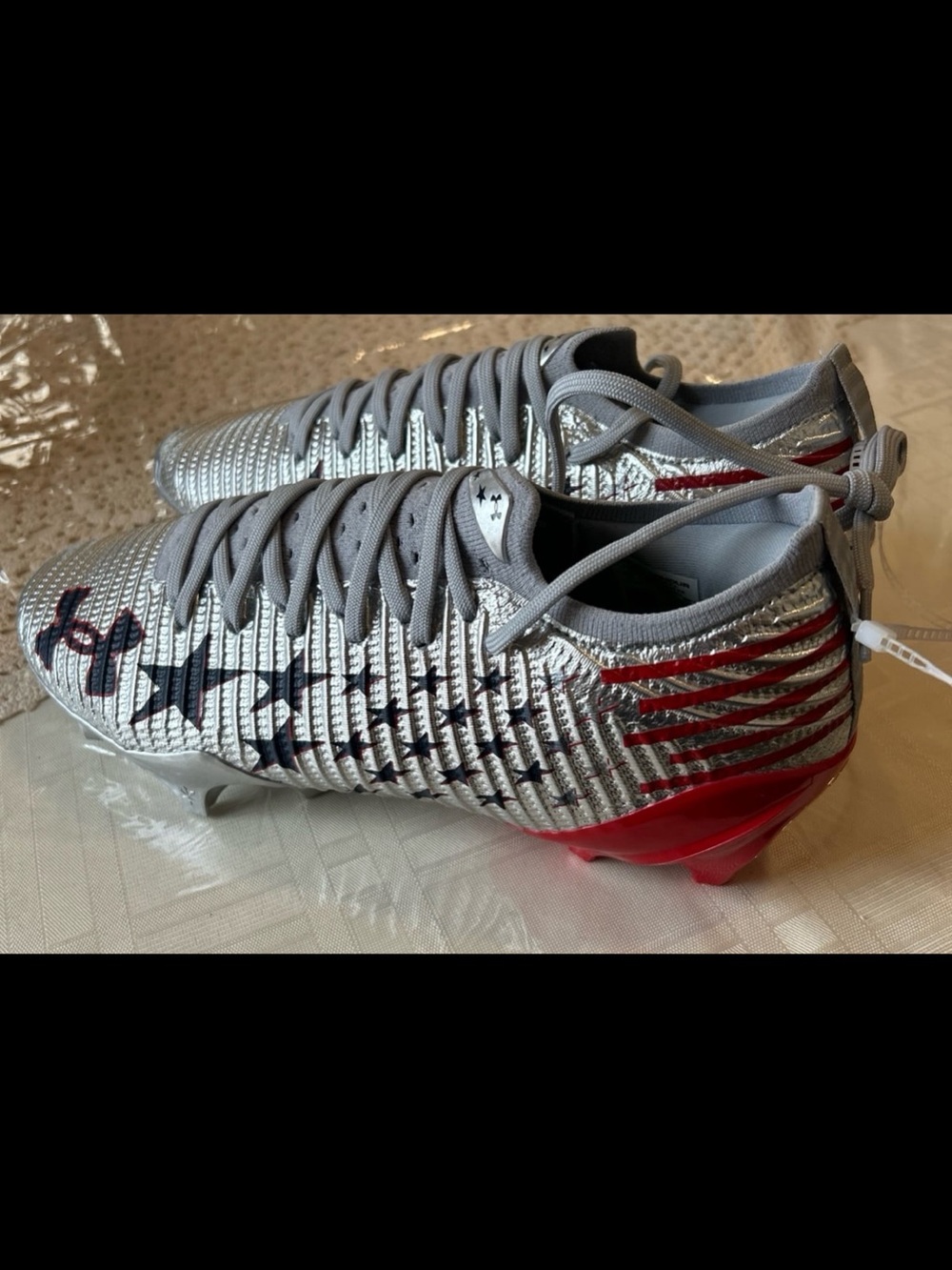 Silver and Red Football Cleats